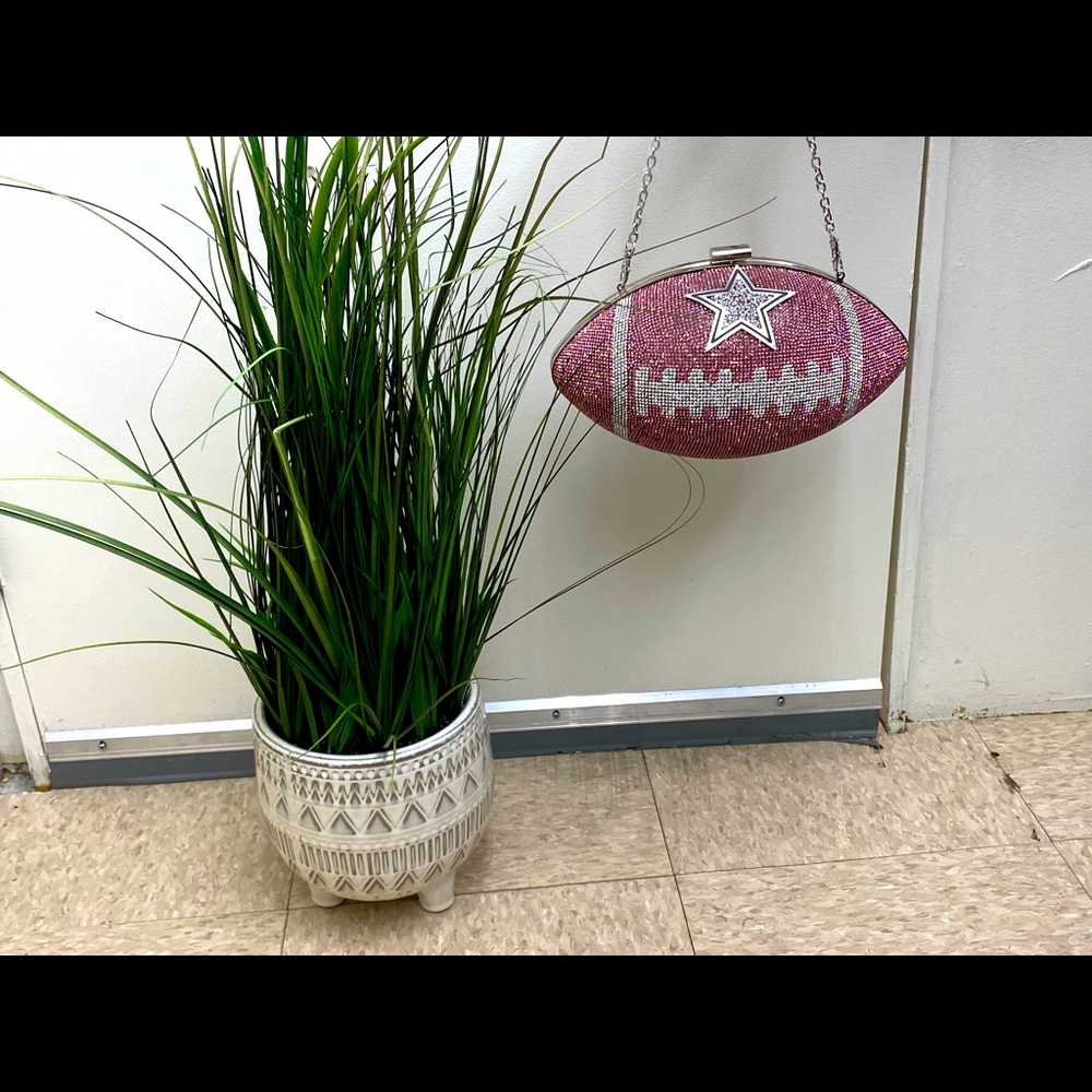 Pink bling football clutch Cowboys.
